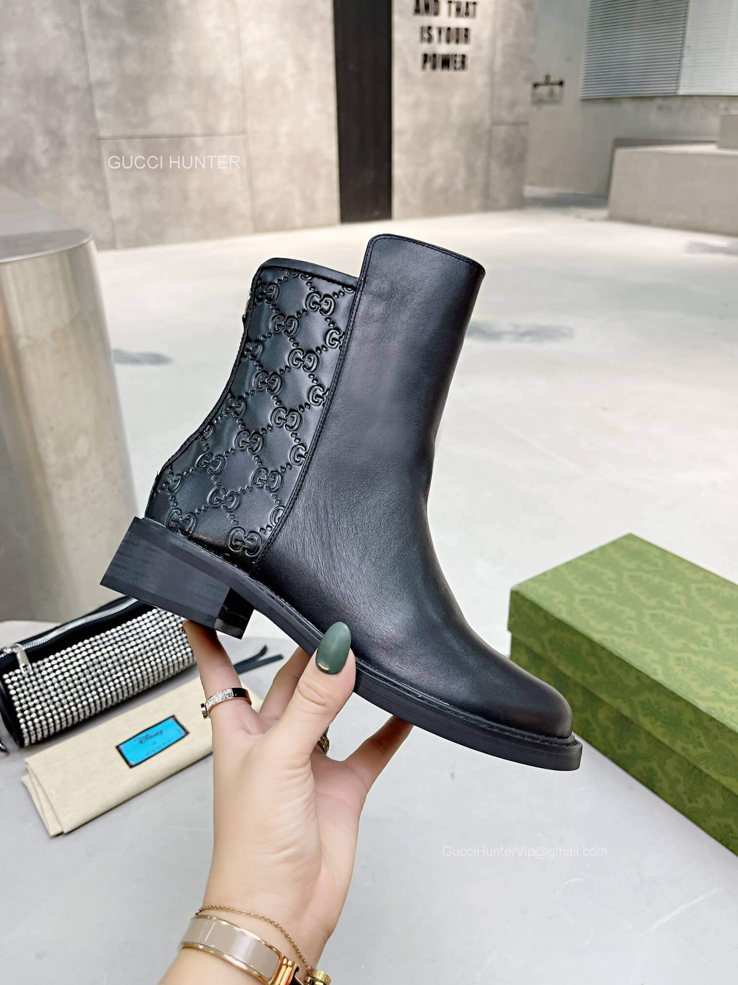 Gucci GG Embossed Leather Ankle Boot in Black 2281452