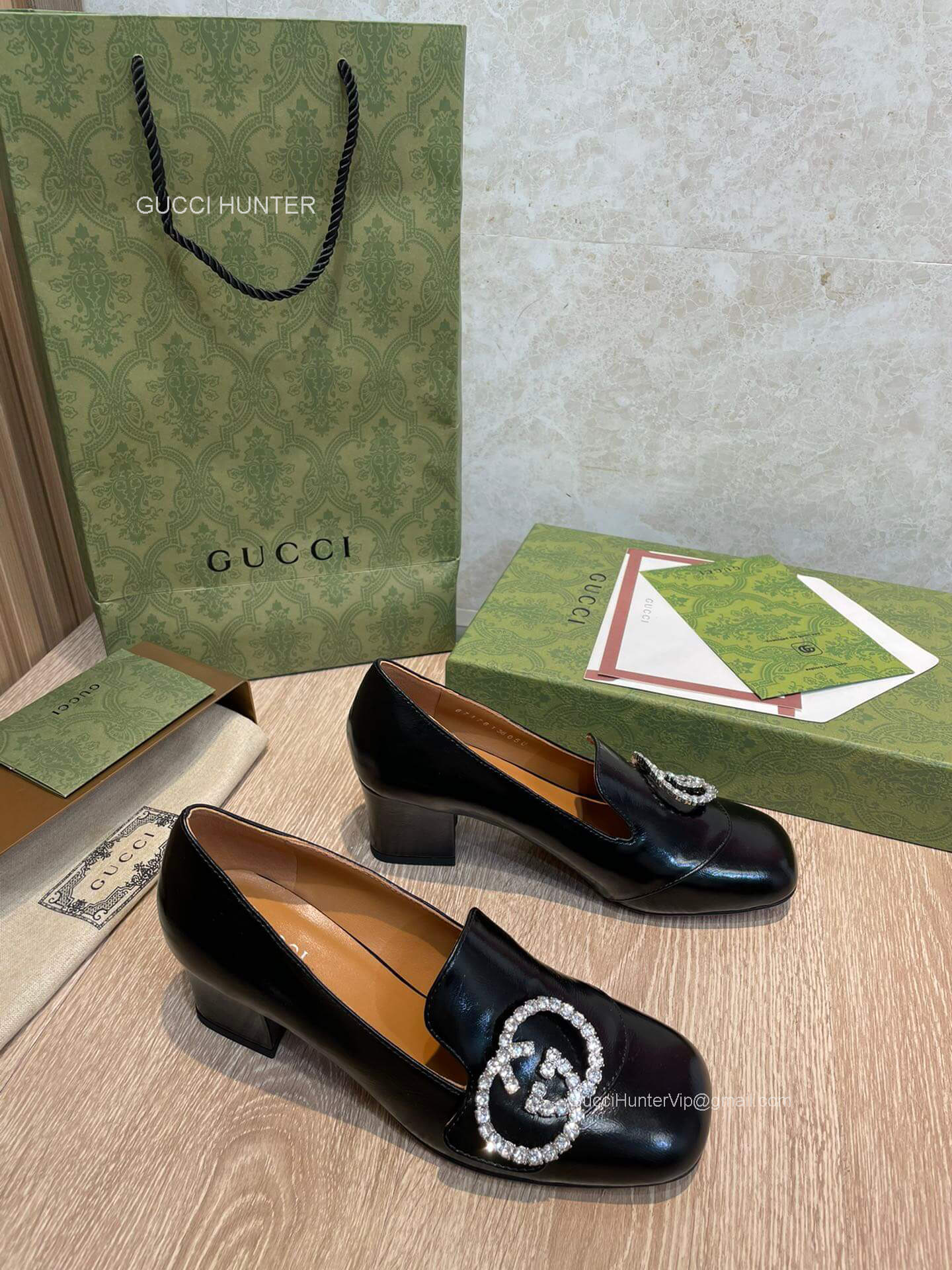 Gucci 2022 Crystals Interloking G Heeled Loafers in Black Shiny Calf Leather 55MM 2281573